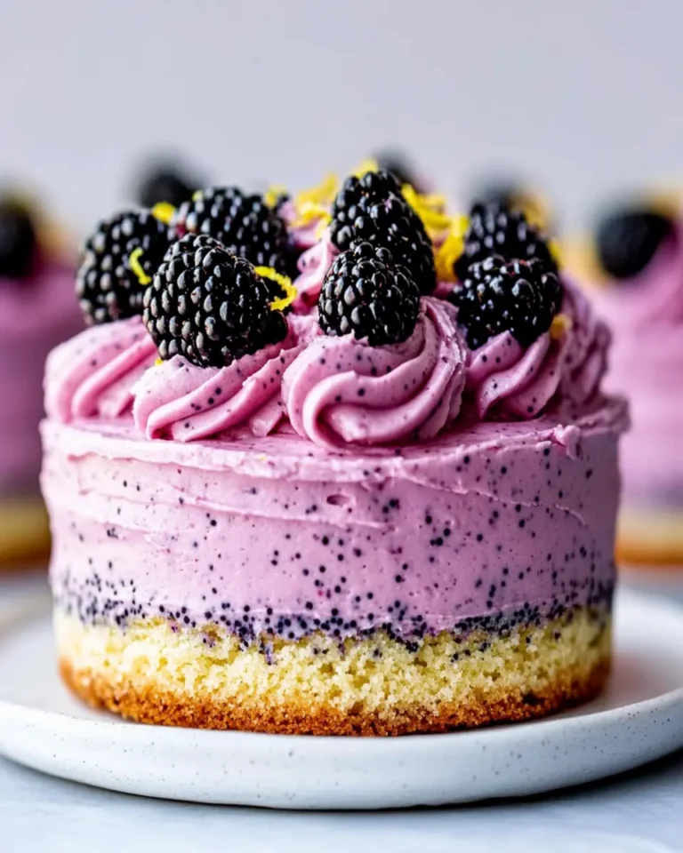 Keto Lemon Poppy Seed Cake with Blackberry Buttercream First Image First Image